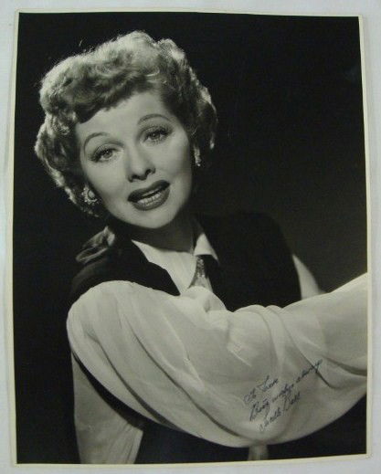 LUCILLE BALL PORTRAIT BY A.L. WHITEY SCHAFER: Back stamp for A.L. Whitey Schafer. Signed in dark blue ink To Jack Best Wishes Always, Lucille Ball. 11" x 14". VF-F Slightest crease black background