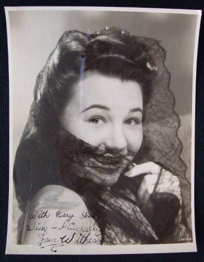 ISP'S ETC - WITHERS.WILDE.GRAY.NEGRI.CORNELL ETC,: JANE WITHERS SIGNED PHOTOGRAPH Inscribed in black ink With every good wish - Sincerely Jane Withers. 8 x 10. VF - F; SIGNED CORNEL WILDE CHECK Drawn on Bank of America. Dec. 13, 1946 in the amount of 