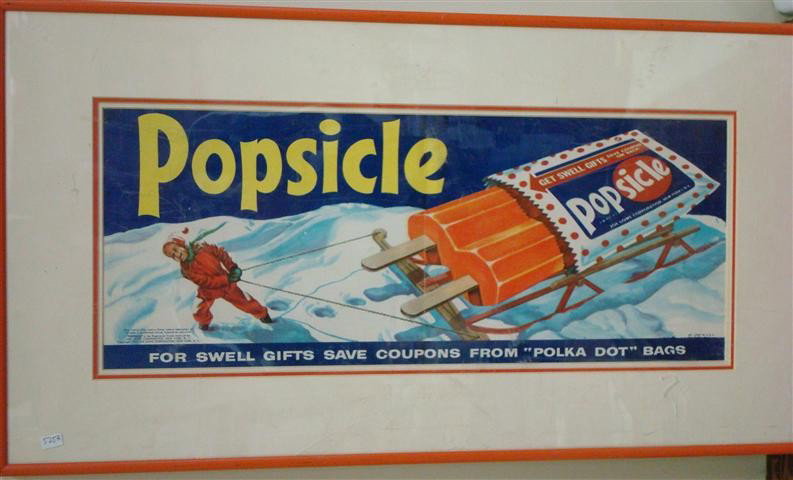 ADVERTISING LITHOGRAPH FOR POPSICLE: Child pulling a sled with oversized orange Popsicle on top. Tag line reads: For Swell Gifts Save Coupons from "Polka Dot" Bags. 1955 Joe Lowe Corporation, New York, NY. 8" x 20"
