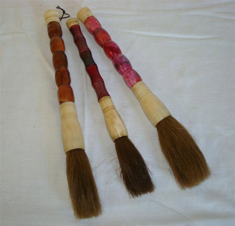 THREE(3) CALLIGRAPHY BRUSHES: set of three(3) calligraphy brushes with ivory mounts and multi colored stone handles