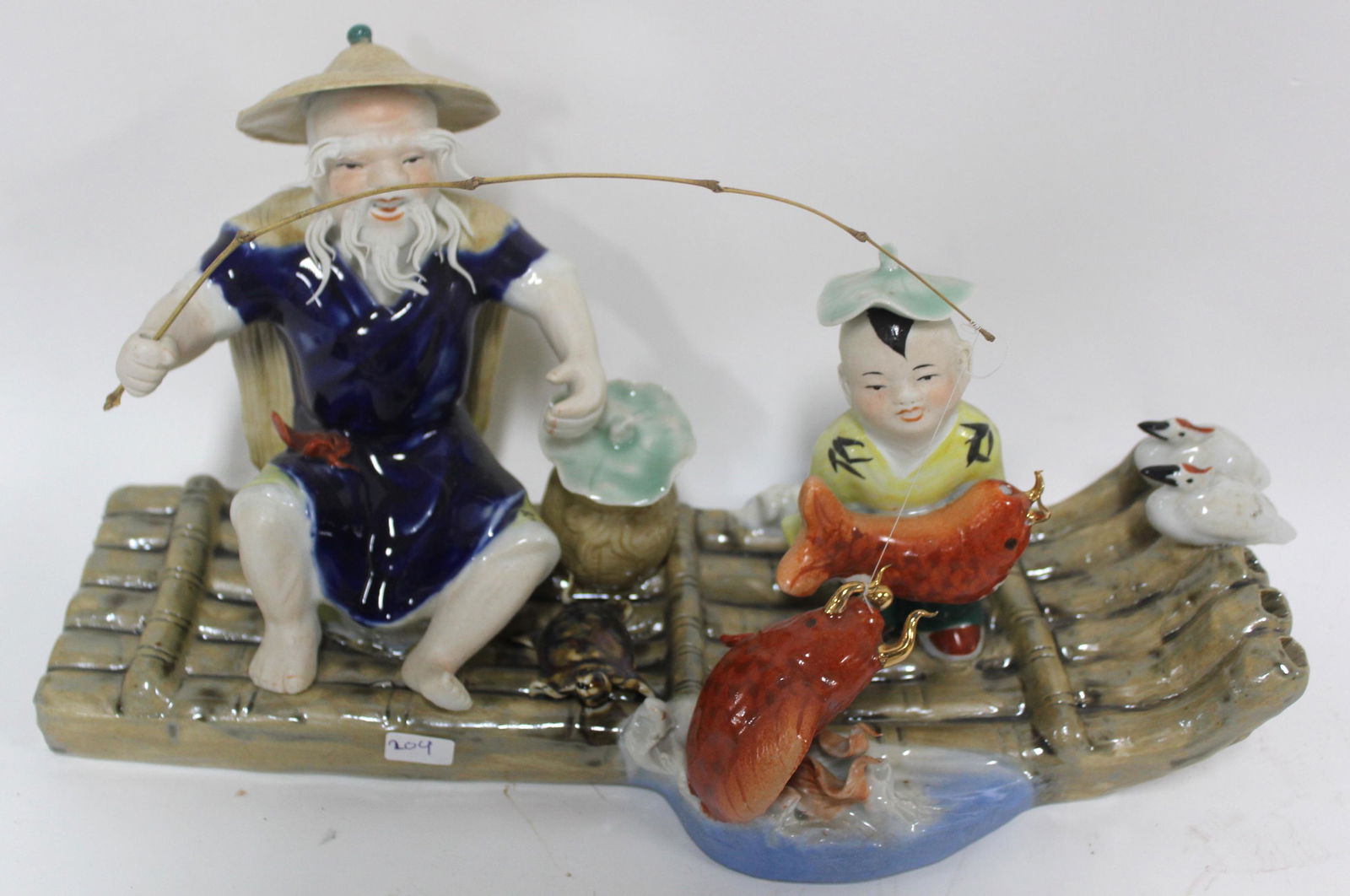 Oriental Porcelain Figure (1 of 3)