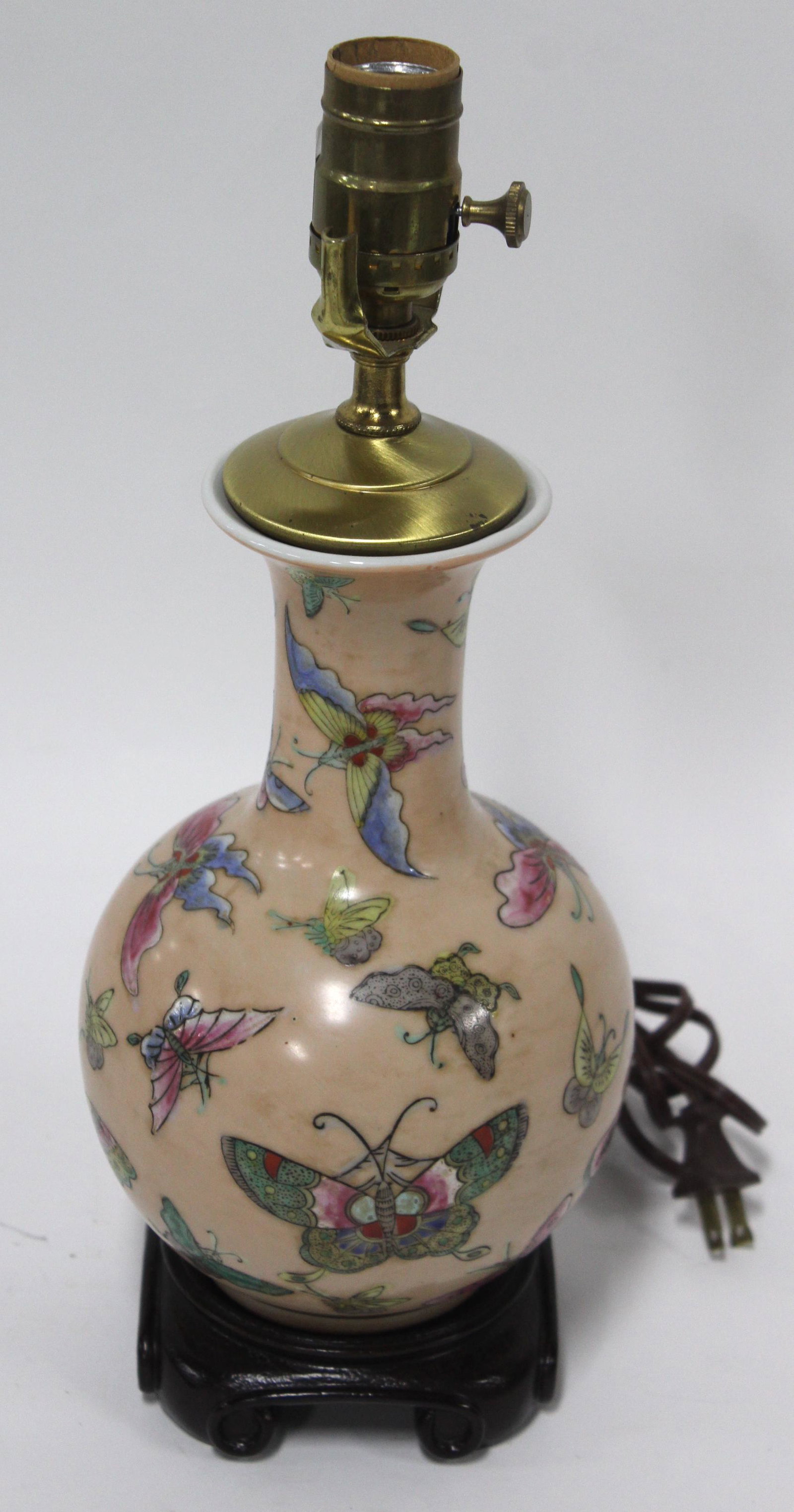 Antique Butterfly Decorated Lamp: Lamp painted in an salmon color with decorations of butterflies 14.5" high.
