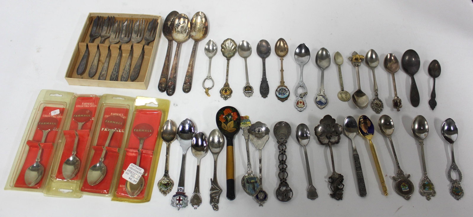 Lot of Dining Utensils (47): Includes 41 spoons from various makers, and a set of 6 identical forks. 47 items total.