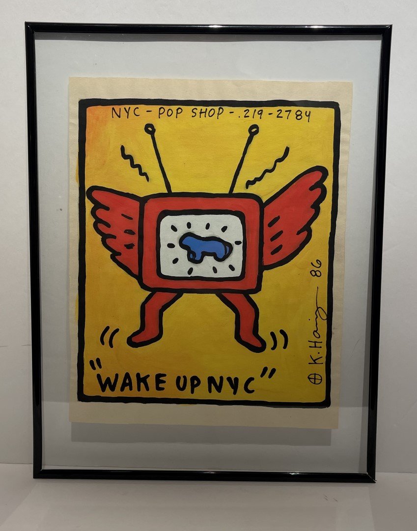 Keith Haring(after); 20thC. Felt -Tip Drawing: Felt-tip drawing on paper. Wake Up NYC - Pop Shop-NYC. 1986. After Keith Haring. Bears signature and artist's device and inscribed NYC Pop-Shop; 9in. X 7.5in.(image), 13.25in. X 10in.(framed)