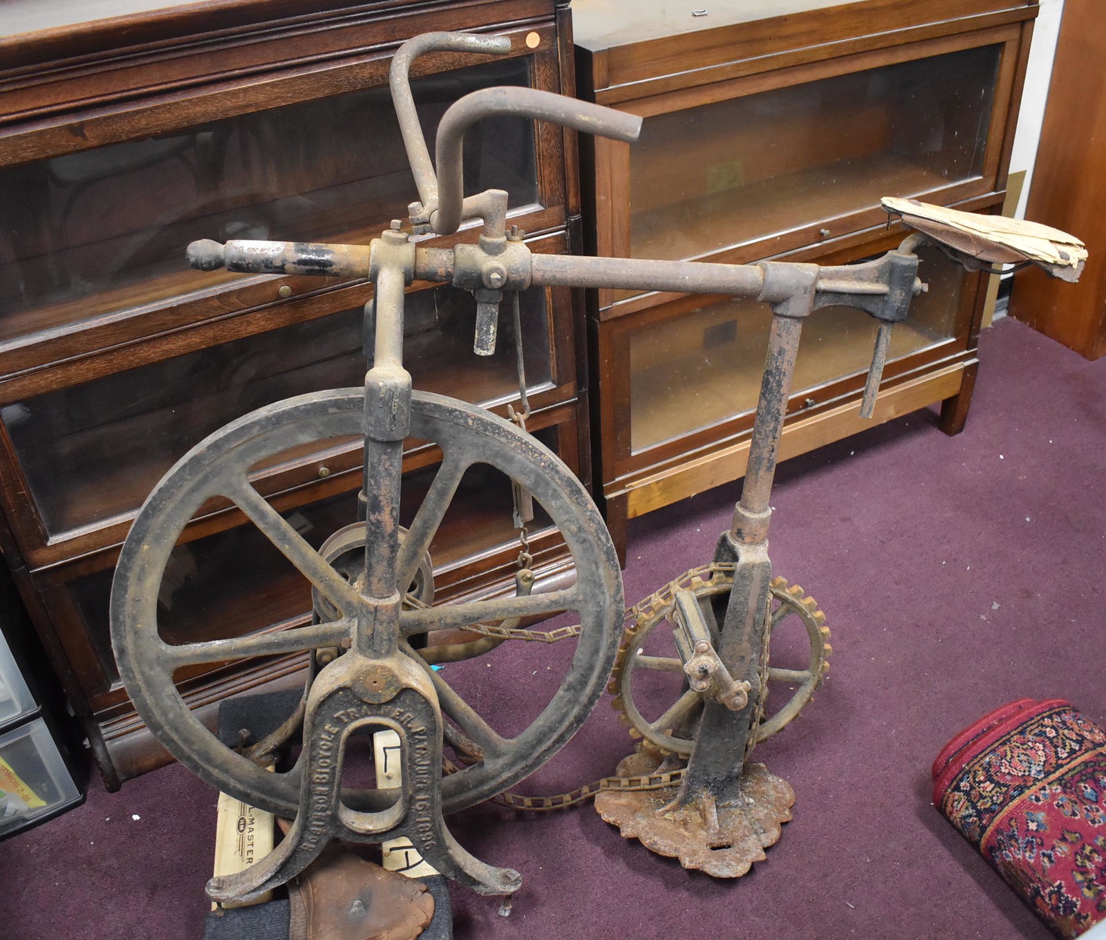 Robinson Bicycle. Trainer. C. 1896: Perhaps earliest known bicycle trainor. Marked Robinson Bicycle Trainer in raised letters. Pat. June 16 1896. Cast iron primitive. 40" H x 48"L.