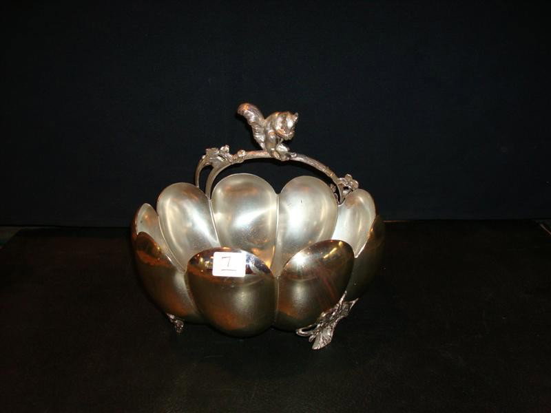 PAIRPOINT FIGURAL SILVERPLATE NUT DISH: On pedestal. Scalloped edge design with figural squirrel balanced on edge. Signed Pairpoint. 7-1/2 h x 7-1/2 w