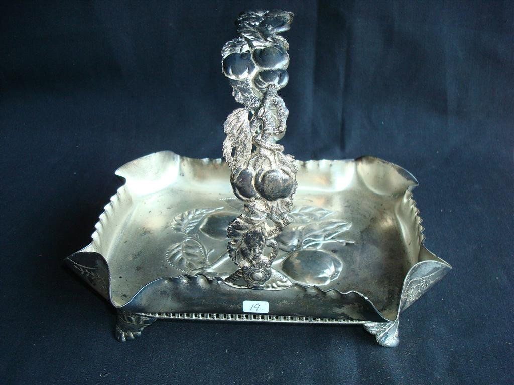 SGD PAIRPOINT CAKE BASKET: Embossed apples at base of tray, apple decorated handle, on four feet. 10-1/2 l x 8-1/4 w x 8-1/2 high