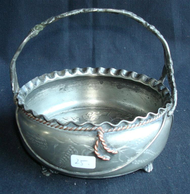 PAIRPOINT BASKET SIGNED: Interior acorn decorations, dogwood blossom handle, and horse bit relief surrounds the word "L'Hoile" engraved on the basket. 5 high
