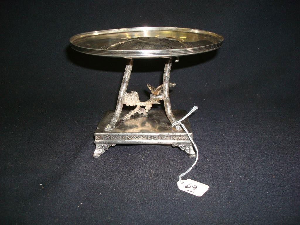 AMERICAN VICTORIAN SILVERPLATE FIGURAL CARD RECEIVE: Butterfly on a branch base. Bird engraving on the card receiver. Indiscernible mark, most likely New England. 6" W x 5'H.