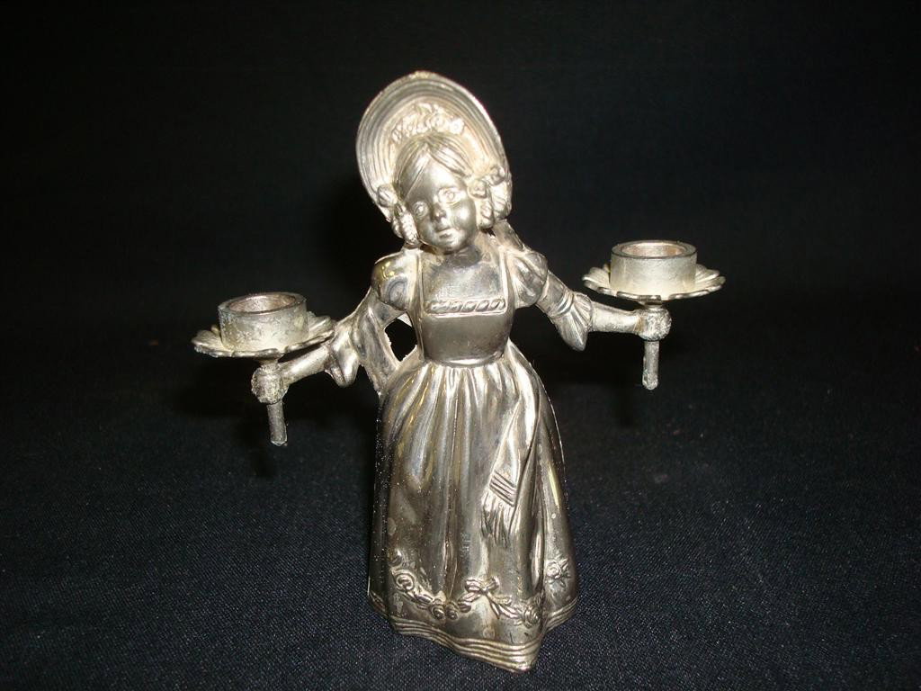 AMERICAN VICTORIAN SILVER PLATE FIGURAL CANDLEHOLDE: Kate Greenaway girl with a candleholder in each hand