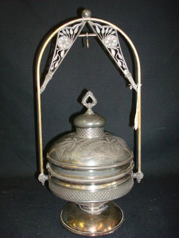 PAIRPOINT AMERICAN VICTORIAN BUTTER DISH: Marked at the bottom for Pairpoint Mfg. Co. Fancy engraved dome top lid with finial. Has liner. 14:H. 5 1/2" D