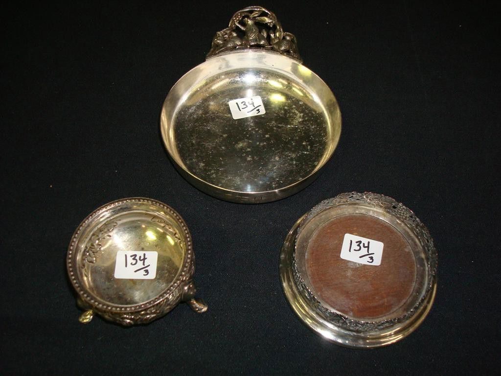 RABBIT DISH; MASTER SALT; WINE COASTER: Rabbit porringer signed Napier and monogrammed R.L.M.; a footed highly repoussed master salt (monogrammed on the bottom); and a coaster signed L. and 3" d.