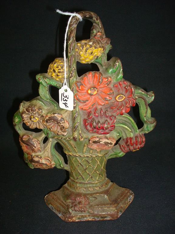 CAST IRON FLOWER BASKET DOORSTOP: Basket of flowers 9 1/2" H
