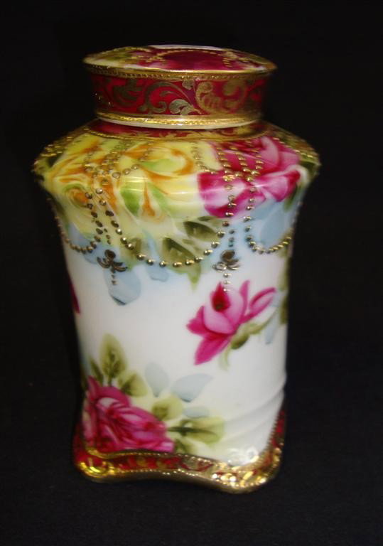NIPPON COVERED JAR: Hand painted floral decorations Blue maple leaf mark. 8 1/4" H.