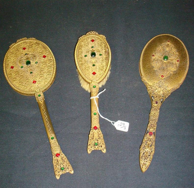 FANCY BRASS DRESSING TABLE ITEMS: Jewel decorated hand mirrors and a brush 11" to 12 1/2"