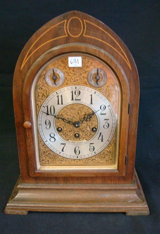 SETH THOMAS GRADUATING CHIME SHELF CLOCK: Cathedral arch top. Inlaid case. 15" H.