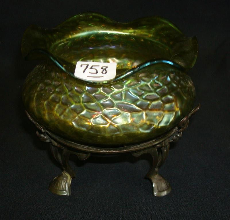 LOETZ RUFFLED BOWL IN AN ART NOUVEAU HOLDER: The art nouveau white metal base holds the Loetz bowl aloft 4 1/2" W x 4" H