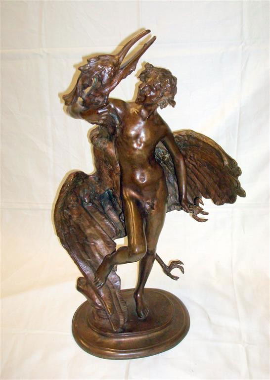 BRONZE BOY WITH AN EGRET SGD. MACMONNIES: Signed Frederick MacMonnies. Copyright Paris, 1890. 27' H.