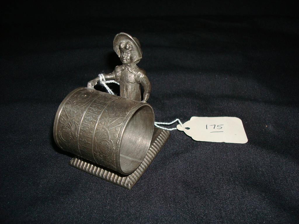 AMERICAN VICTORIAN SILVERPLATE NAPKIN RING: Kate Greenaway girl holds ring on a base. Southington