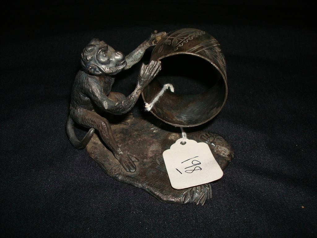 AMERICAN VICTORIAN SILVERPLATE NAPKIN RING: James. W. Tufts #3308. Large monkey on an irregularly shaped base