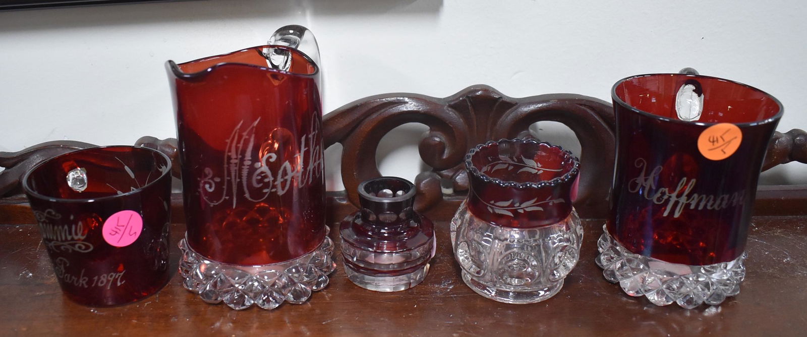 Ruby Red Flashed Souvenir Items (5): Included in the lot is Mommie, Asbury Park, 1897, Mother pitcher, inkwell, toothpick holder and a mug , Hoffman. Varying sizes. 4 1/4" to 2"
