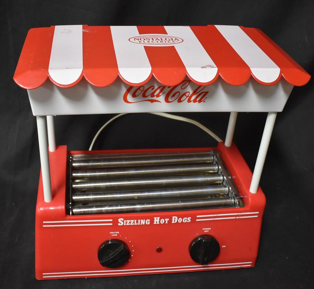 Coca Cola Frankfurter Cooker: Electric. Lift top box at top to hold the frankfurters or rolls. 14"W. x 14|H x 8"D New Condition.