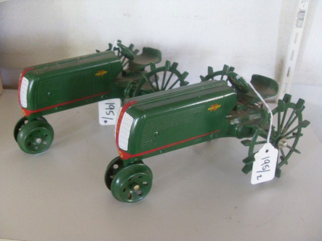 TWO OLIVER ROW CROP 70 TRACTORS: Two Oliver row crop 70 tractors. Both are marked 1938. One marked 3624 and the other marked 1717. Both have the JLE metal button stamped No. 83 attached to the tractor seat. 8" long