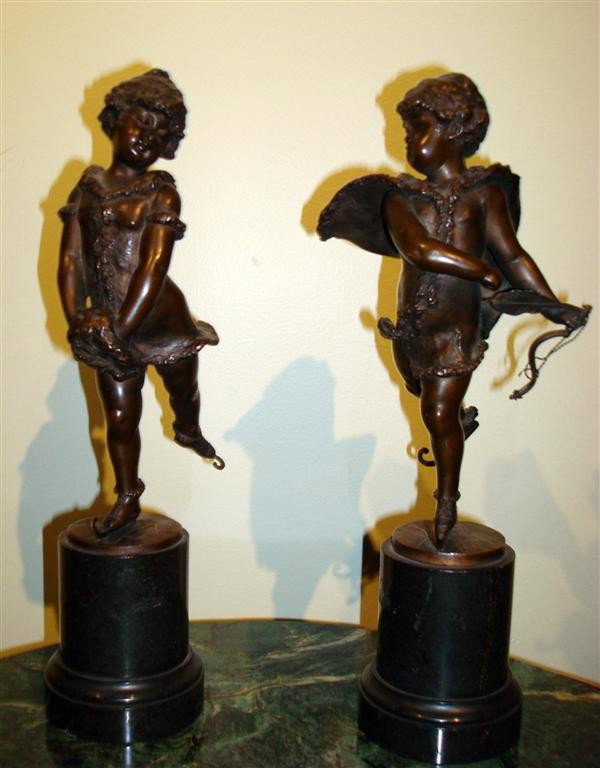 F. TIFFLAND; PAIR OF BRONZE FIGURES SIGNED: Pair of bronze figurers, boy and girl skaters signed; on marble pedestals; 10.5in. H.