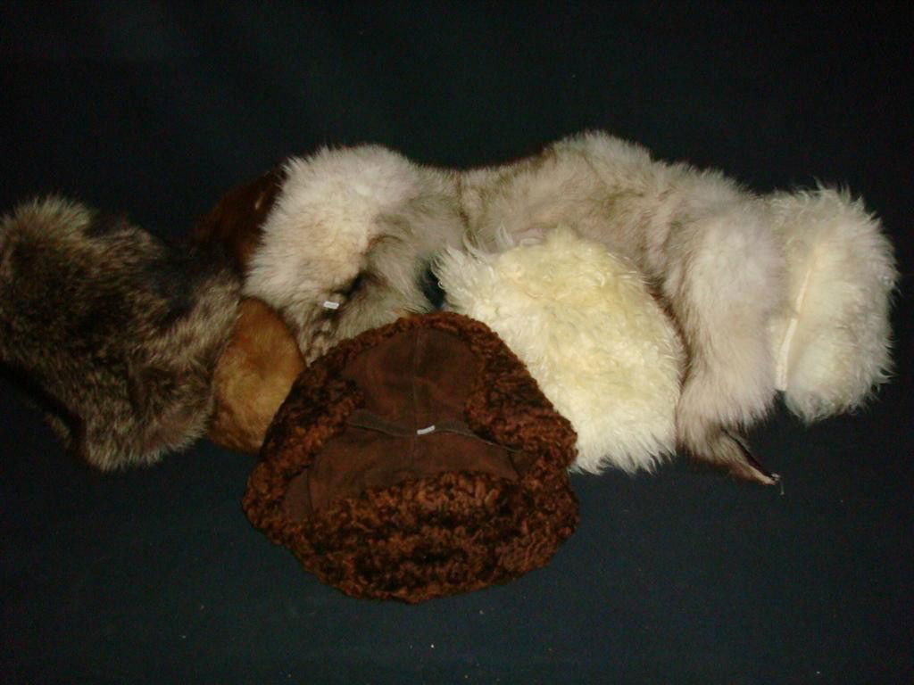 LOT OF MISCELLANEOUS FUR ITEMS: To include: three(3) fur hats, a fur piece, a Finnish brown Persian lamb hat, a Kangol hat and two(2) other lamb's wool hats