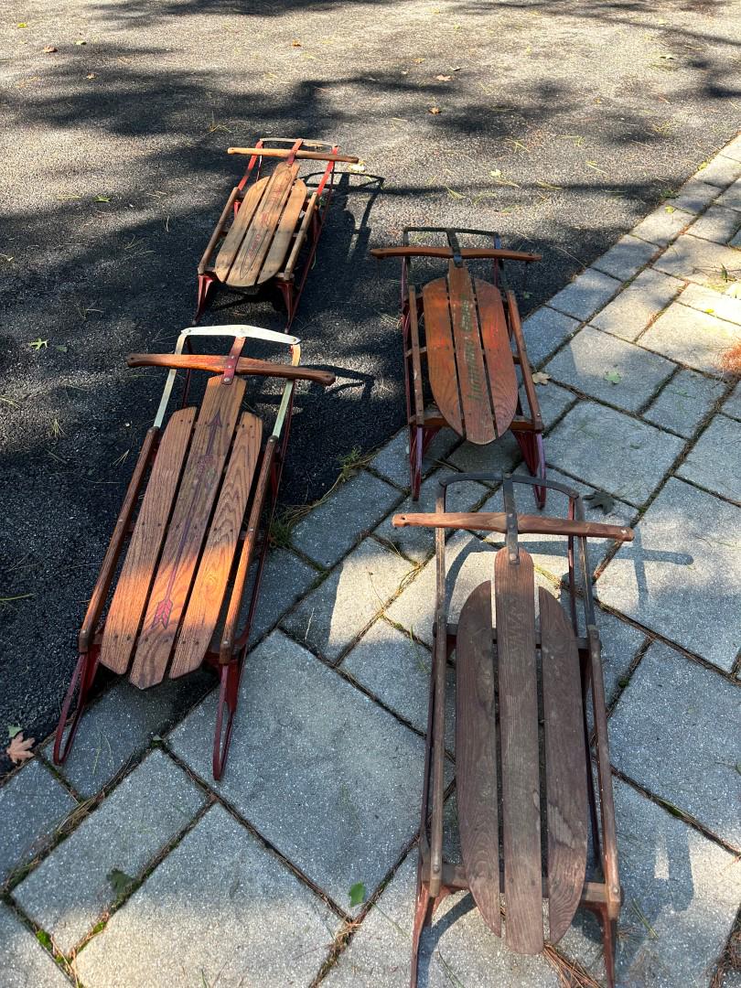 Four(4) Vintage Metal and Wood Sleds: Four(4) antique metal and wood sleds.Various models; 40in. - 45in.L.