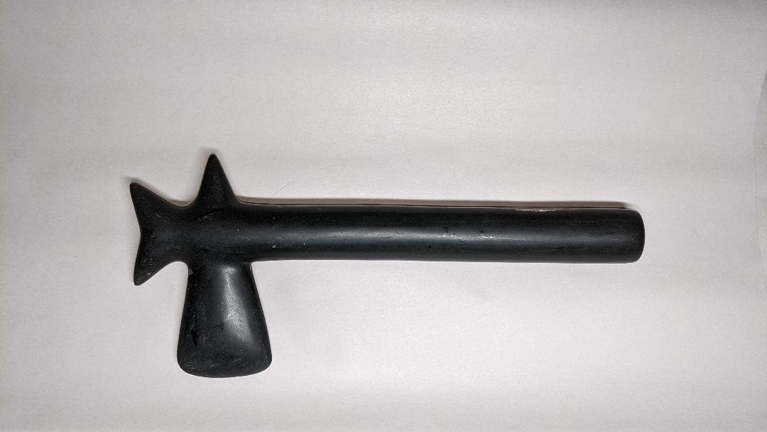 Superb Taino Mid-Phase Hacha: One of the best, a badge or symbol of highest rank, the former property of a regional Cacique, (High Chief) or, of his highest Priest. Beautifully carved and with a laboriously rendered high polish, t