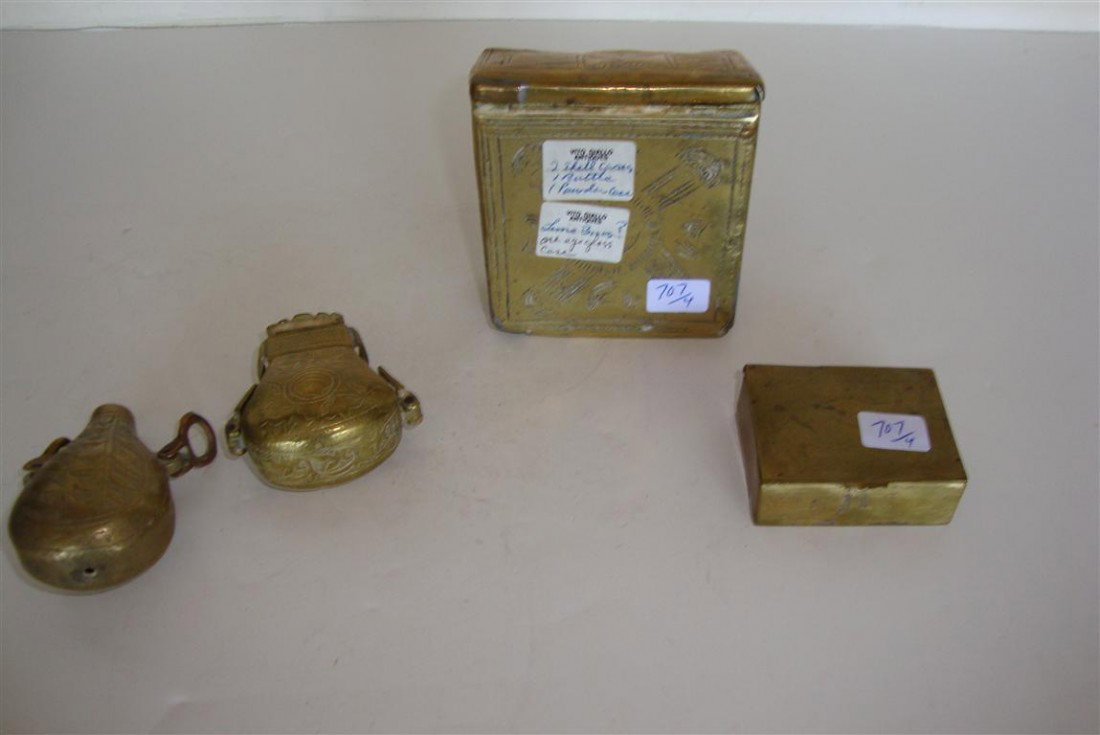 FOUR BRASS ITEMS: Hinged brass match case';brass flask with wooden stopper and ring handles; square brass hinged box and a larger decorated hinged box 2"H. to 3 1/2"H