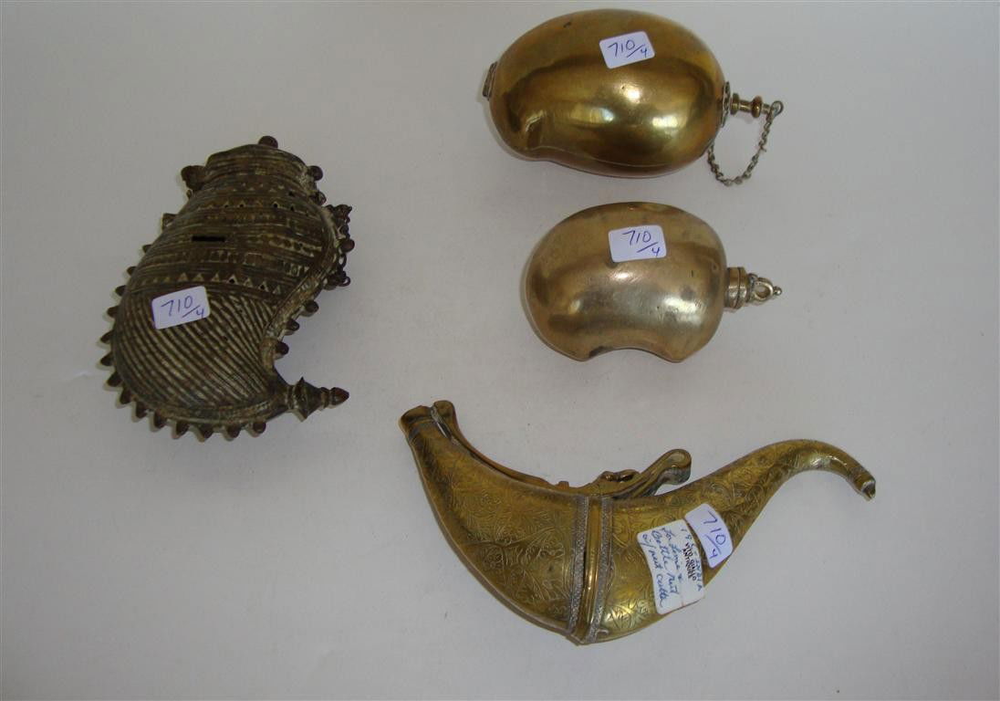FOUR BRASS ITEMS: Unusual hinged brass egg shaped container with screw peg and fitted interior; a brass snuff bottle with screw top; hinged container-shell form along with a 19th C. beetle nut containter with cutter 3