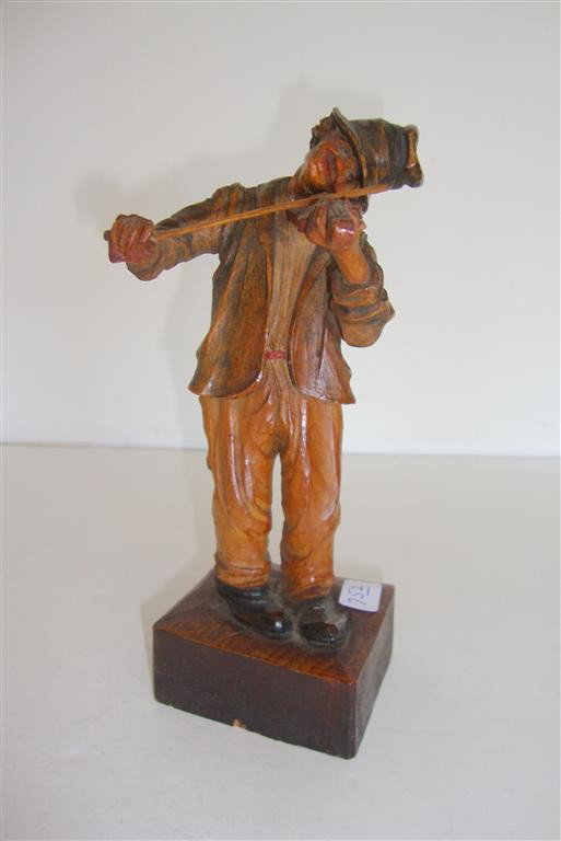 BAVARIAN WOOD CARVING OF A VIOLIN PLAYER: Polychromed. Well detailed with realistic facial features. 7"H