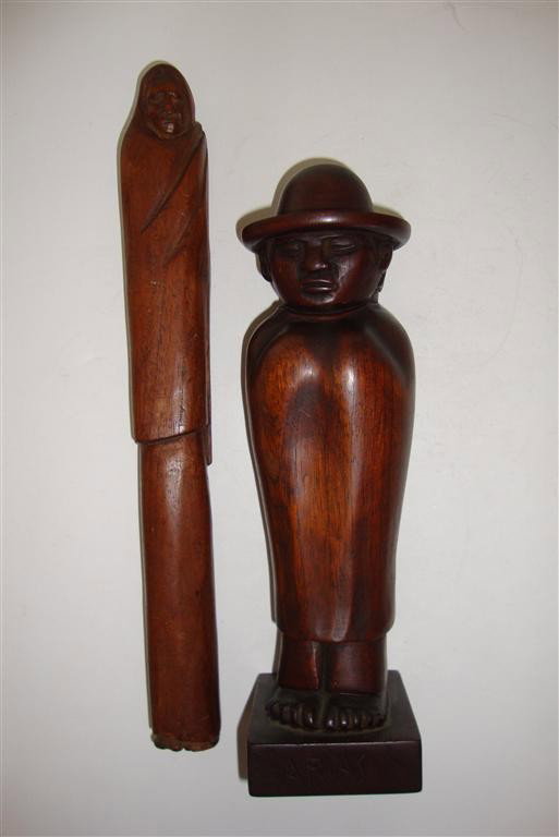 TWO(2) MEXICAN WOOD CARVED GROUPINGS: Two(2) Mexican wood carved figures- shrouded woman, 13in. H.; figure of a man inscribed Arias, 11in. H.