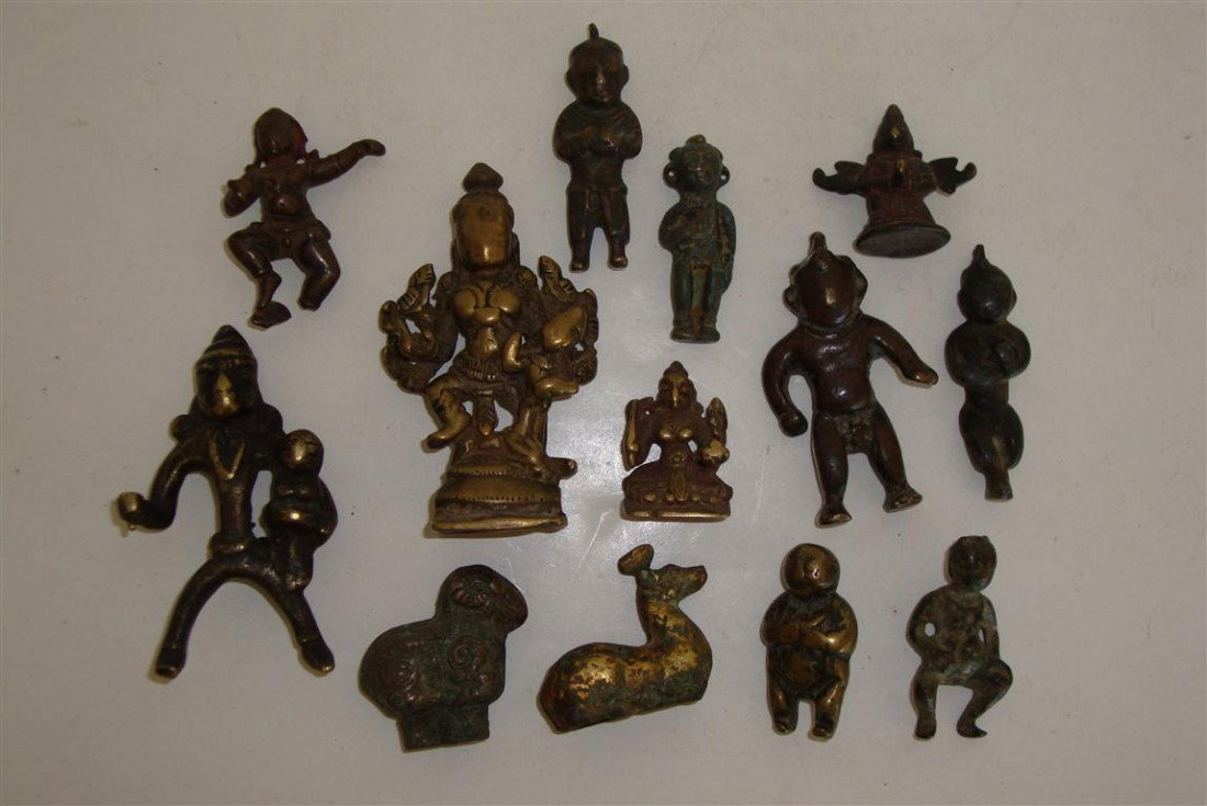 LOT OF 13 MISCELLANEOUS MINIATURE BRONZE FIGURES: Lot to include: thirteen(13) miniature African, Indian and Chinese bronze figures; 1.5in. - 3.5in. H.