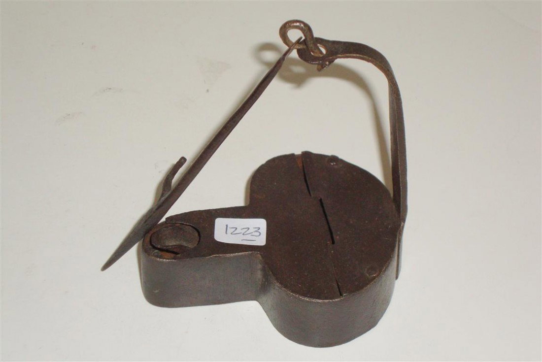 19TH C. IRON BETTY LAMP: Hand wrought construction including the hand forged nails 5"H