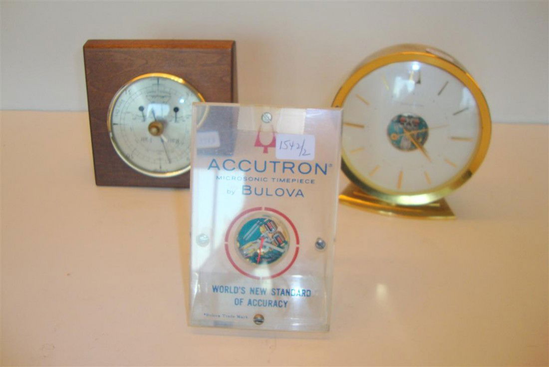 ACCUTRON BULOVA TABLE CLOCK AND A BULOVA ADV. PC.: 5 1/2"H