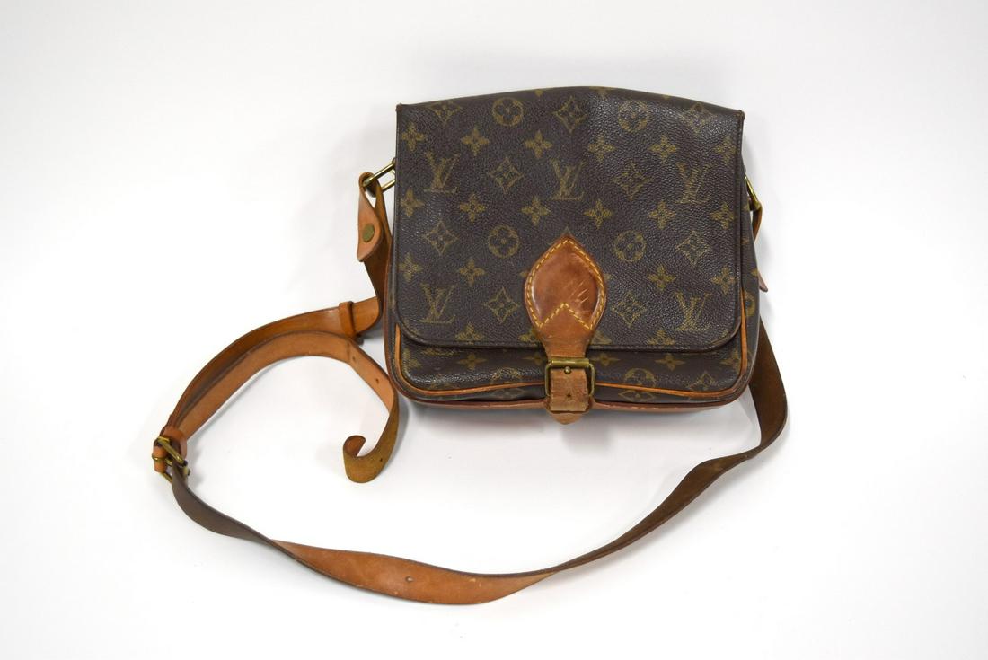 Louis Vuitton Handbag: Brown leather; 7.5in. X 9.5in.