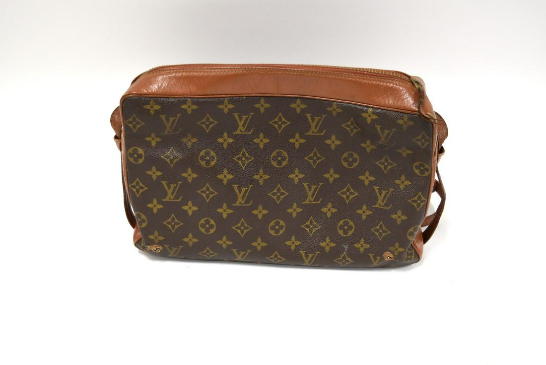 Louis Vuitton Handbag: Brown leather; 10in. X 13in.