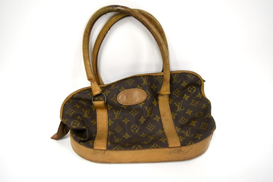Louis Vuitton Handbag: Brown leather; 8in. X 13.5in.