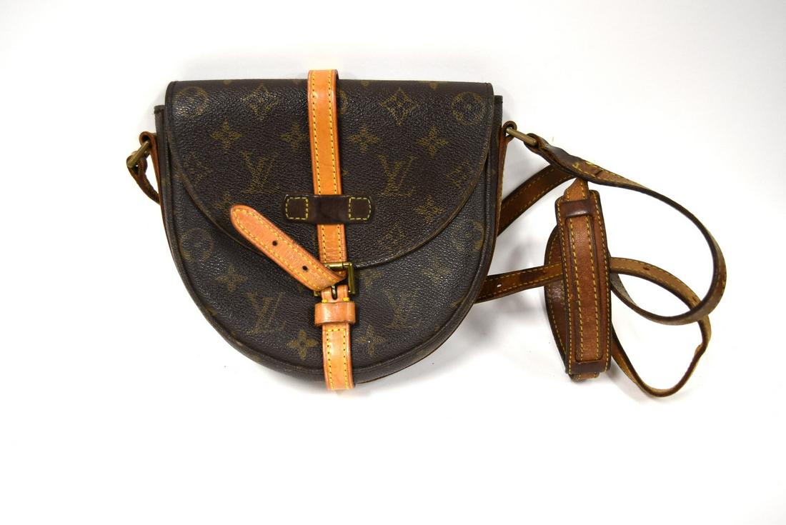 Louis Vuitton Purse: Brown leather; 7in. X 8in.