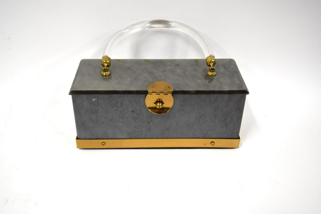 Dorset - Rex Lucite Purse: Grey pearlized lucite. Brass trim; 4in. X 9.25in.