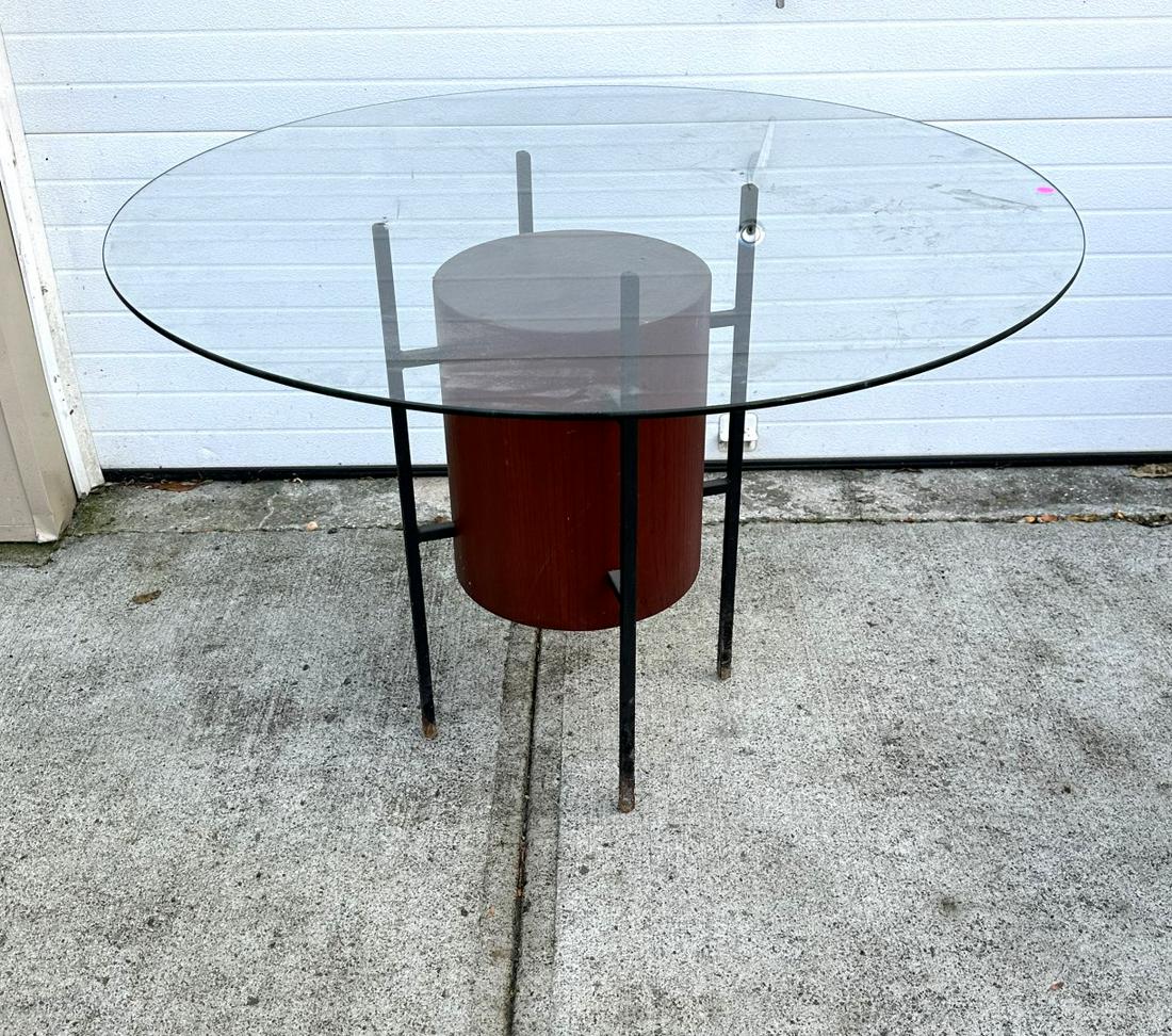 Mid-Century Modern Wood and Iron Glass Top Table: Cylindrical wood and iron dining table. Round glass top; 29in.H. x 42in.D.