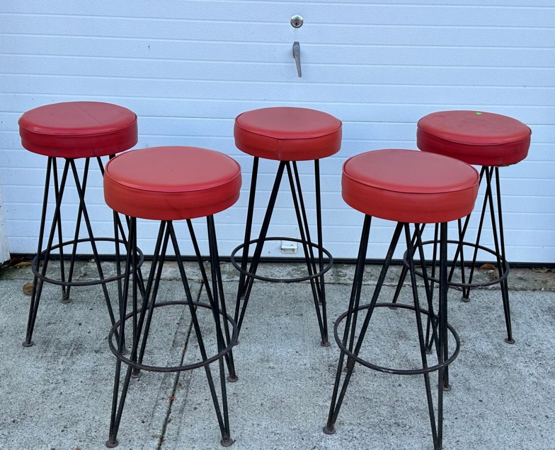 Vintage 1950's Bar Stools(5): Five(5) upholsted iron bar stools. Red naugahyde seats; 31in.H. x 14in.D.