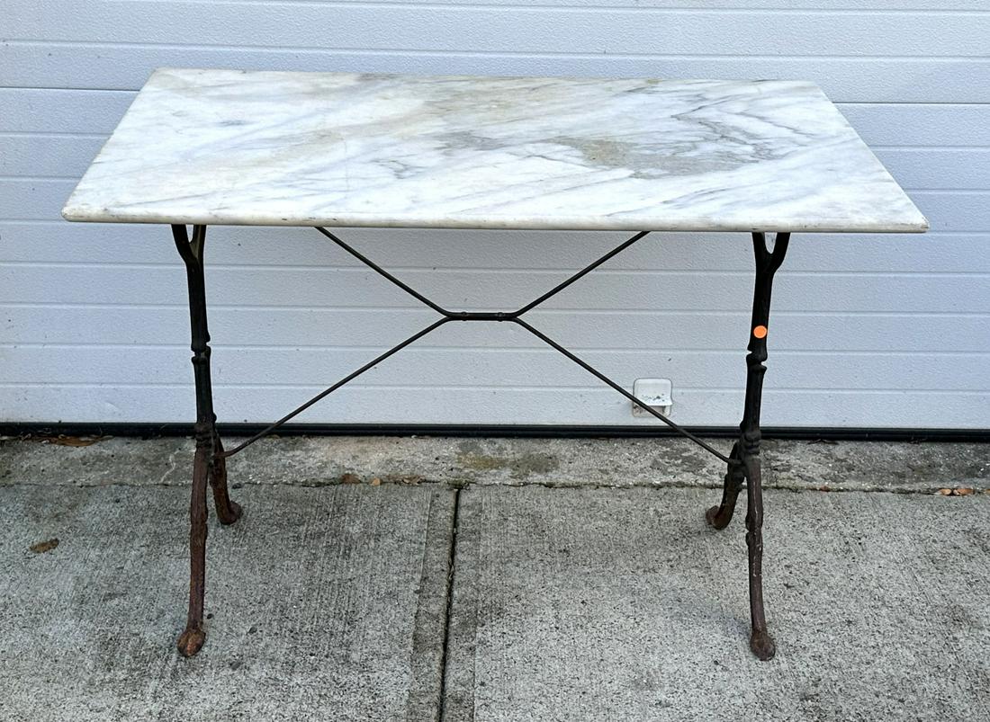 Victorian Marble Top Iron Table: Cast iron rectangular table. Marble top; 28in.H. x 39.5in.W. x 24in.D.