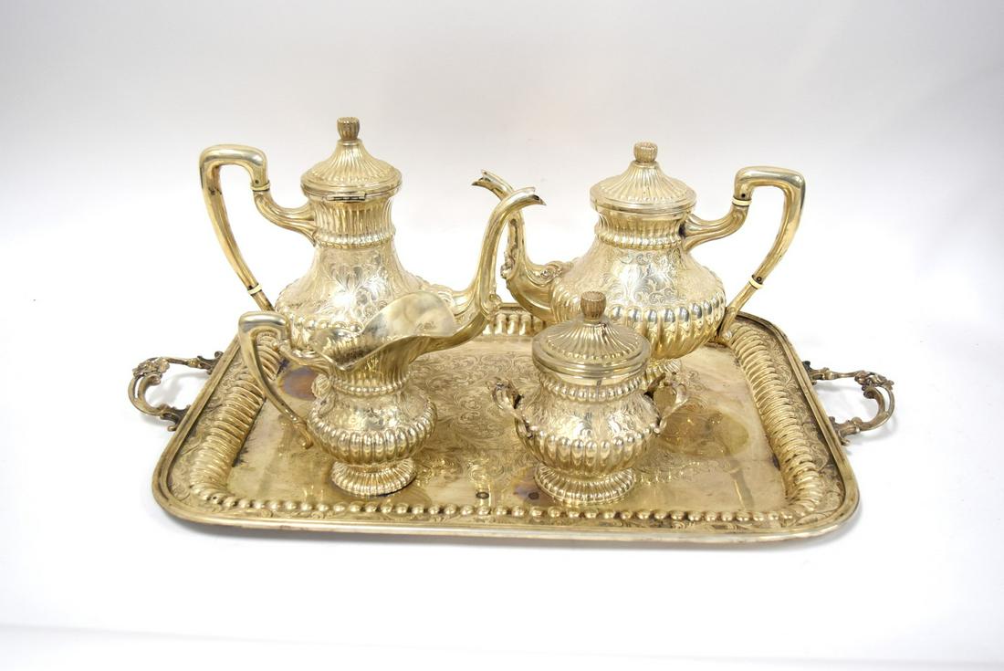 Five(5) Piece Continental .800 Silver Tea and Coffee Service: Comprised of: tray, coffee, tea, sugar, creamer. Impressed with hallmarks and stamped 800; 15.5in. X 25in.(tray), 5.5in. - 9.5in.H. (service)