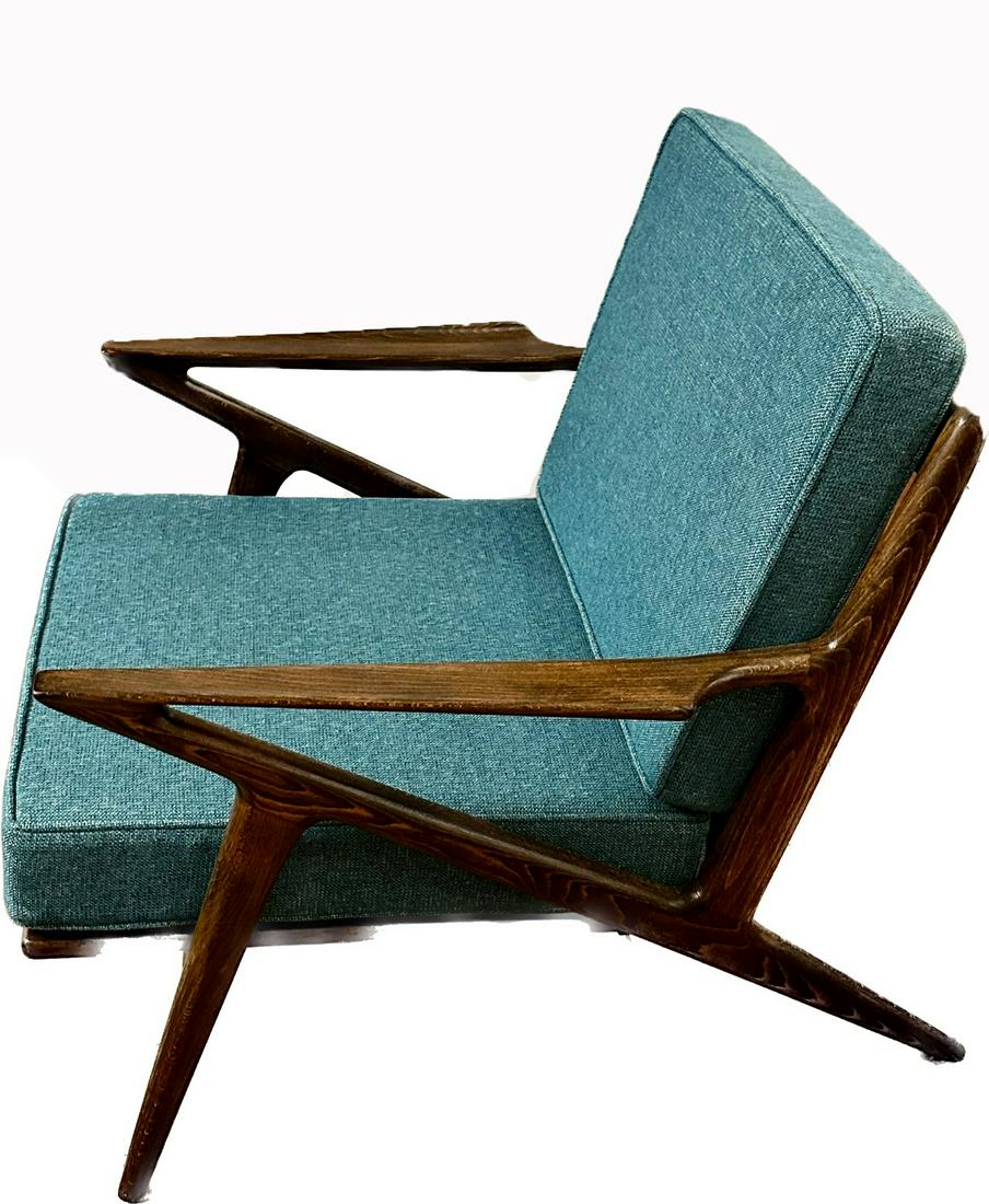 Poul Jensen Danish Modern Walnut Z Chair: Danish Modern walnut Z chair. Designed by Poul Jensen for Selig. Impressed "Made In Denmark" on stretcher bar. Replacement cushions in blue tweed pattern; 27in.H. x 30in.W. x 36in.D.