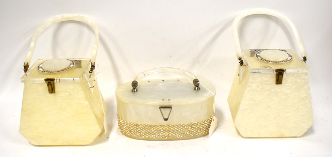 Lewsid Jewel NYC Lucite Purses (2) & a Third: Two Lewsid NYC Jewel lucite purses for Llewellyn Inc. C. 1950's (one marked at the interior) together with a third Lucite beaded purse. Three in the lot.
