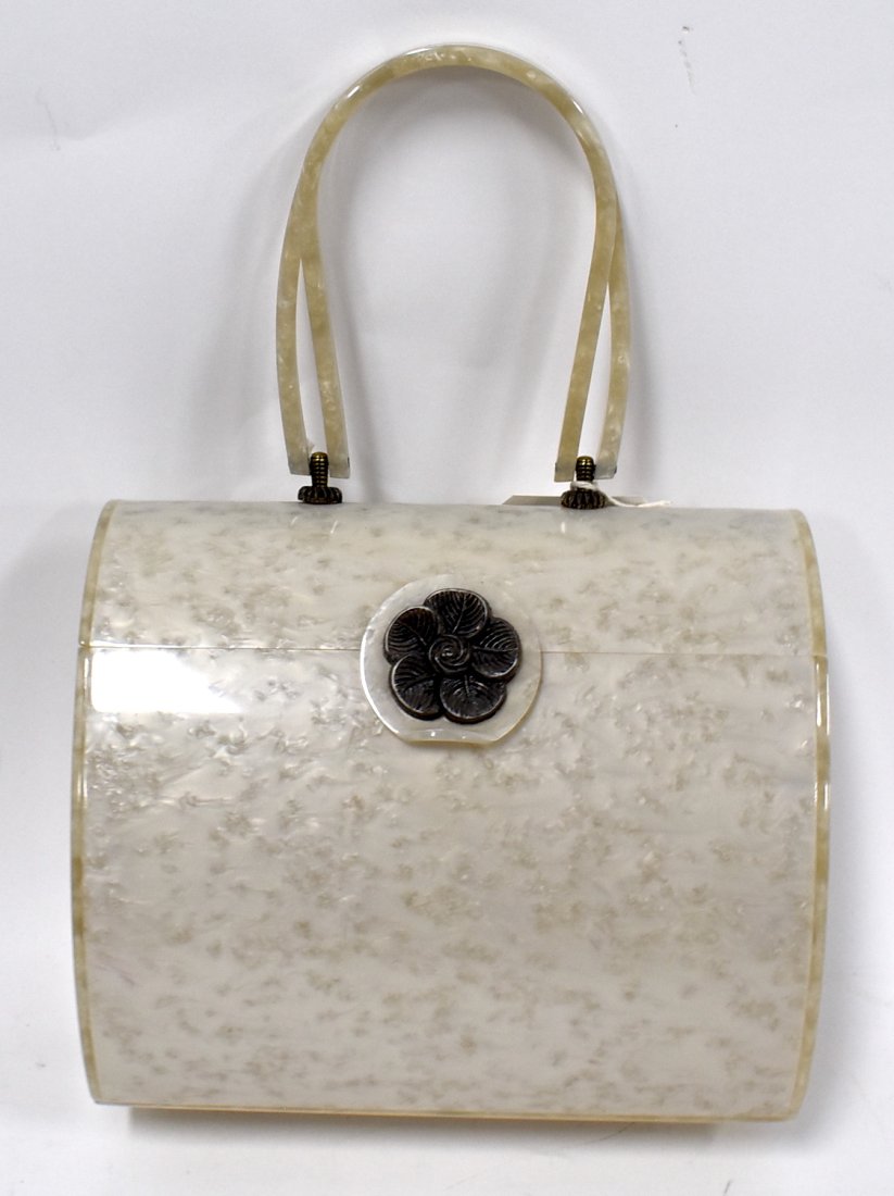 Wilardy Lucite Purse: White marbleized dome topped purse, double handled with ornate floral silverplated clasp. Marked at the insdie.